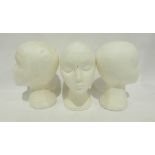 Three polysterene heads for display