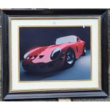 Colour print Ferrari, 73 x 86cm to include the frame, ebonised wood with gilt bubble slip