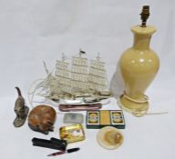 Plastic model of a galleon which lights up, a carved wooden cat asleep, another cat, boxed cards,