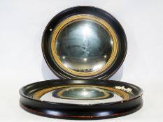 Pair of circular convex wall mirrors (2)  Condition ReportWear throughout including patches of paint