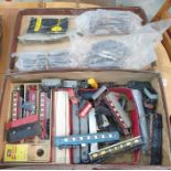 Suitcase and contents of model railway accessories including a Trix Meteor Diesel Express set,