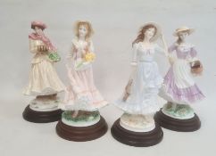 Royal Worcester 'The Four Seasons' figurines to include 'Winter', 'Spring', 'Summer' and 'Autumn' (