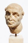 Marble bust of a man with tonsure hairstyle, possibly Roman (with losses), on square marble base,