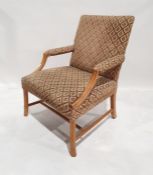 20th century armchair with upholstered seat, back and arm rests, moulded frame