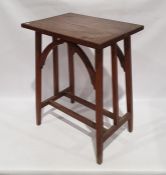 Early 20th century oak Arts & Crafts-style table, the rectangular top on square section supports,