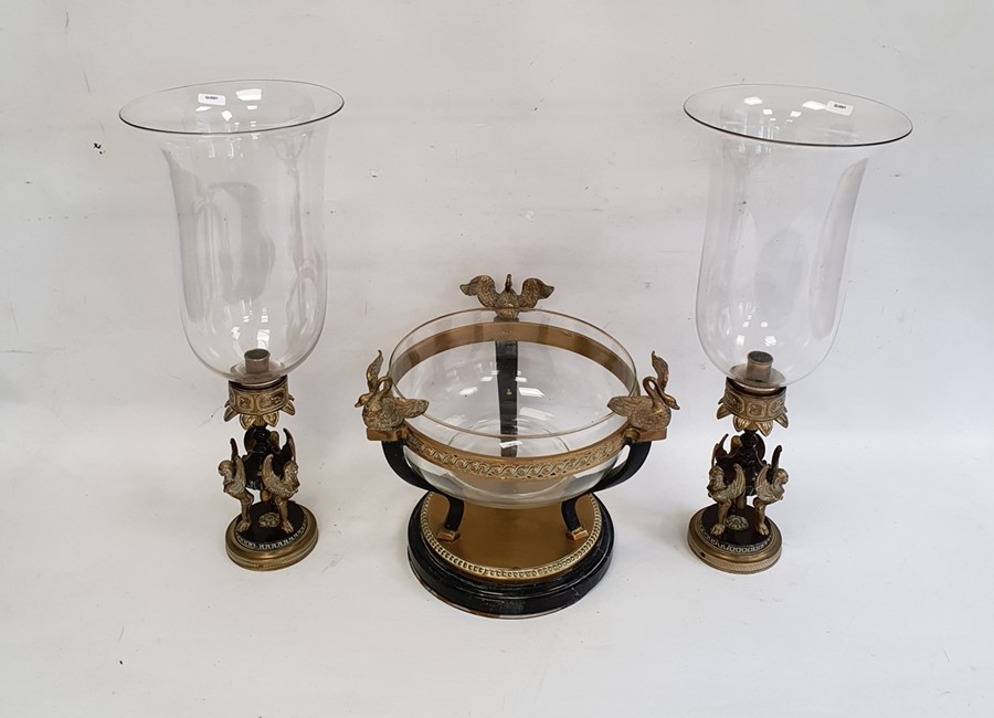 Modern metal garniture comprising a pair of lamps supported by sphinxes with glass storm shades - Image 2 of 3