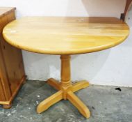 Modern beech drop-leaf kitchen/breakfast table, on single pedestal  Condition ReportWidth 90cm