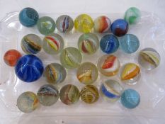 Small quantity of assorted sized marbles (26)