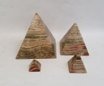 Set of three graduated hardstone pyramids and one other, tallest 23cm high (4)