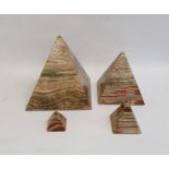 Set of three graduated hardstone pyramids and one other, tallest 23cm high (4)