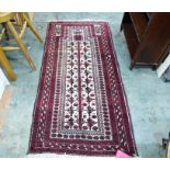 Eastern style rug with cream ground central panel, with Tree of Life pattern and three borders of