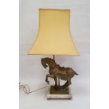 Table lamp surmounted by a plaster model of a horse, on rectangular marble base