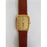 Gent's gold plated Omega de Ville wristwatch with rounded oblong dial, baton numerals, side button