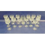 Set of fourteen Stuart cut glass hock glasses together with a glass vase