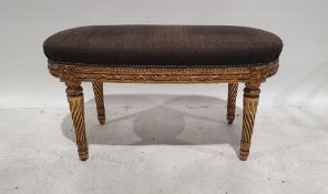 Possibly 19th century French stool, of rectangular form with rounded ends, finished in gilt