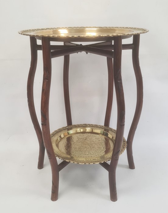 Two-tier Eastern hardwood occasional table, the folding bamboo-effect stand fitted with two brass