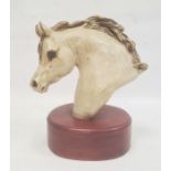 Ceramic sculpture of a horse's head by Irene French, with incised signature, on wooden plinth