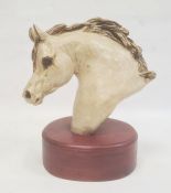 Ceramic sculpture of a horse's head by Irene French, with incised signature, on wooden plinth
