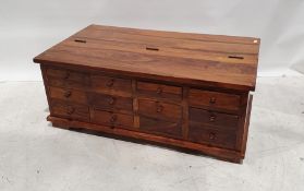 Eastern hardwood coffee table with 12 assorted drawers and lift-top compartment