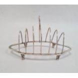 Silver six-division toast rack by Nayler Brothers, London 1989 of shaped oval form with ring handle,