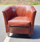 20th century brown leather tub chair on tapering supports Condition ReportSome wear to seams. Chip