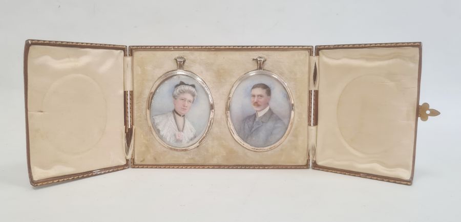 Pair of Edwardian portrait miniatures on ivory depicting a lady and gentleman, signed with