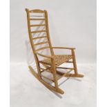 Shaker style ladderback rocking chair with woven seat