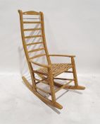 Shaker style ladderback rocking chair with woven seat