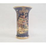 Carltonware pottery chinoiserie vase, the blue ground gilt and relief decorated with pagoda and