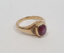 9ct gold ring set with a star ruby cabochon, finger size T 1/2, approx 6.1g and a 9ct gold,