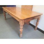 Pine kitchen table with rectangular top, on turned legs, 181cm wide