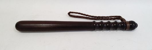 Turned wooden truncheon with leather strap