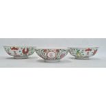 Pair of Chinese bowls, the exteriors with enamelled decoration of fruit, bats and character marks,
