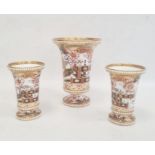 Garniture of three Spode vases each of cylindrical form with flared rims and bead borders, decorated