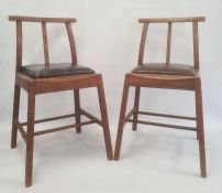Pair of Arts & Crafts-style oak chairs (2)  Condition ReportWear and cracking to leather seat of