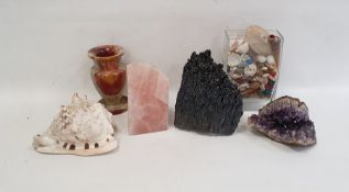 Amethyst geode, two further geodes, a turned hardstone vase, a conch shell and a vase of assorted