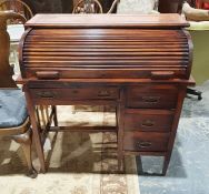 20th century Arts & Crafts style desk, the leather top with cut decoration, roll top, leather