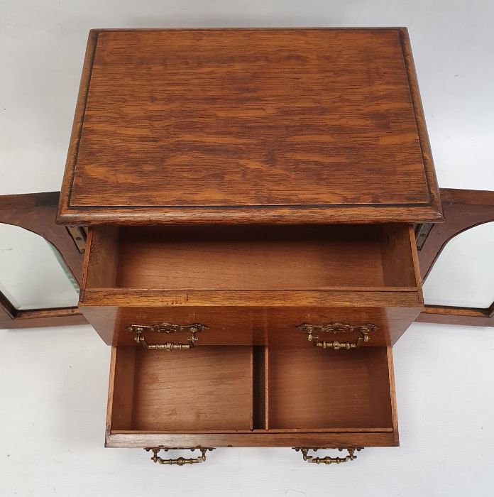 Edwardian oak smoker's cabinet, the two glazed doors with bevelled glass revealing two drawers, 26cm - Image 4 of 5