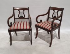 Set of four mahogany boardroom chairs with sabre front legs (4)