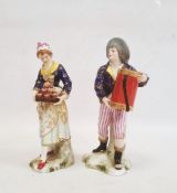 Derby porcelain figure of a woman selling pies, painted mark to base, 17cm high and another Derby