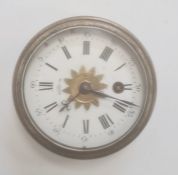 Travelling alarm clock of circular form, the enamel dial with Roman numerals, outer seconds dial and