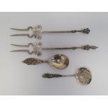 Pair of Dutch silver pickle forks with figural finials (one with losses) and two continental caddy