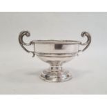 Silver two-handled pedestal bowl by J Boseck & Co, Birmingham 1911, of circular form with scroll