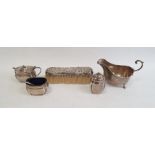 George V silver sauceboat of revived Georgian style, having open C-scroll handle, reeded rim and