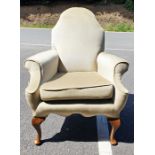 Perhaps 1930's armchair, the shaped back in green velour upholstery, on cabriole legs