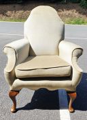 Perhaps 1930's armchair, the shaped back in green velour upholstery, on cabriole legs