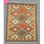 Small Maimana kilim rug in browns and greens etc., 81cm x 64cm.