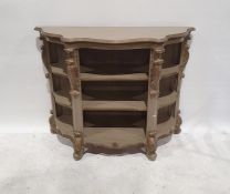 Modern French-style set of shelves with serpentine front, acanthus leaf decorative moulding,