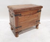 Eastern hardwood chest with iron rivets and bindings, on turned supports, 61cm x 53cm