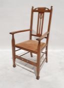 20th century oak carver chair in the Arts & Crafts manner
